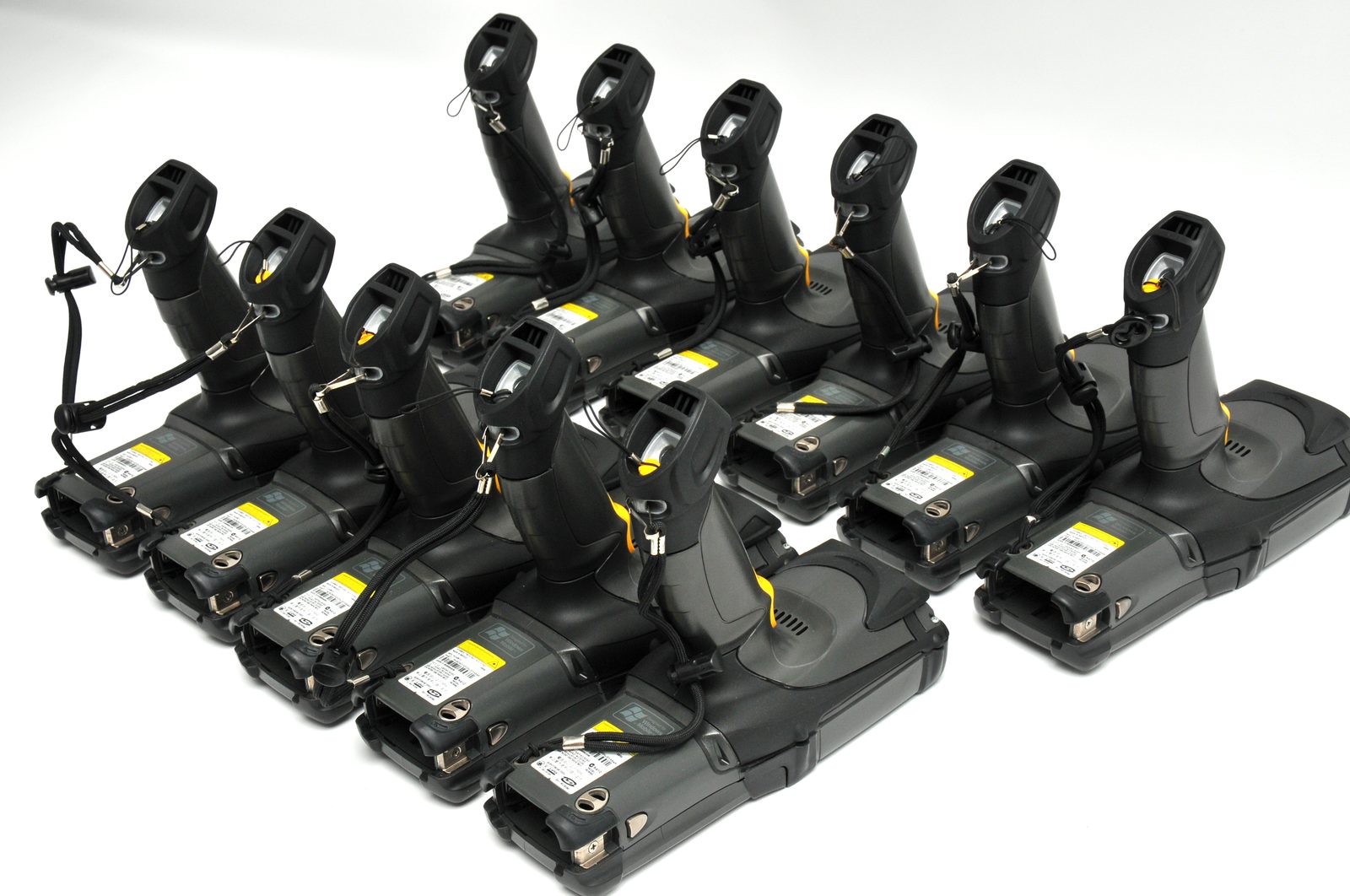 Fleet of Motorola MC9090 handheld computers in a multi-unit charging dock